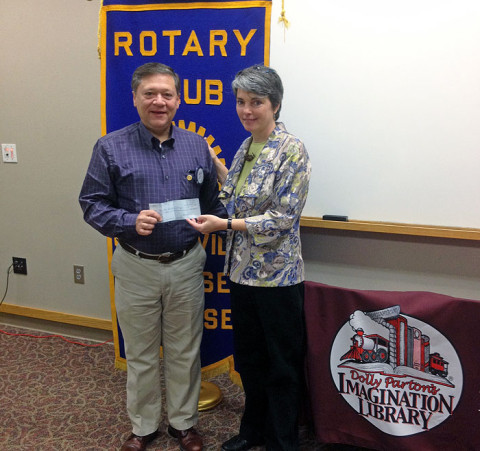 Montgomery County Imagination Library receives $1,000 check from Sunrise Rotary Club