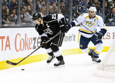 Los Angeles Kings right wing Dustin Brown (23) and Nashville Predators defenseman Shea Weber (6) battle for the puck in the first period at the Staples Center. (Photo by Kirby Lee - USA TODAY Sports) Los Angeles Kings right wing Dustin Brown (23) and Nashville Predators defenseman Shea Weber (6) battle for the puck in the first period at the Staples Center. (Photo by Kirby Lee - USA TODAY Sports)