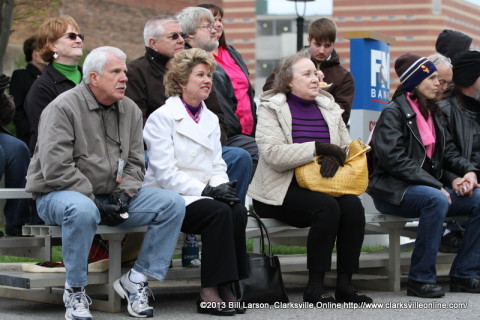 Clarksville Mayor Kim McMillan and City Councilman Geno Grubbs watches the Beatles cover band Yesterday perform from the bleachers at the Public Square Stage 