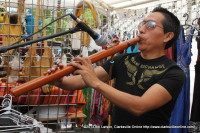 A Native American Flutist plays at the 2013 Rivers and Spires Festival