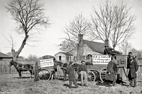 Wagons and camera of Sam A. Cooley, U.S. photographer, Department of the South, Circa 1865. Wet plate glass negative. 