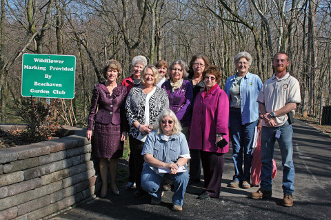 Clarksville Mayor Kim McMillan and the Beachaven Garden Club at the wildflower sign installation at Clarksville Greenway.