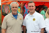 Hilltop Super Market manager Mike Jackson and Montgomery County Sheriff John Fuson