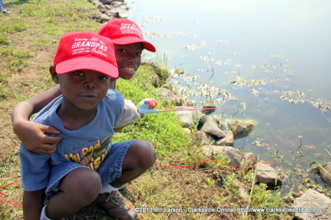 Two boys fishing at the 2013 TWRA Youth Fishing Rodeo at Liberty Park