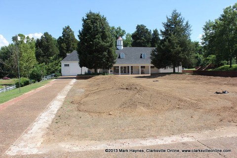 Dunbar Cave State Park prepares plaza area for new Butterfly Garden.