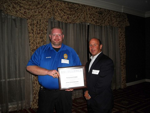 Montgomery County Animal Control Officer Matt Heaton (Right) accepts the Public Safety Award from GNRC President Scott Foster (Left) at the annual awards banquet.