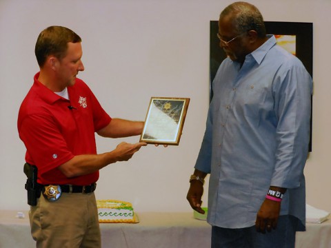 Montgomery County Sheriff John Fuson presents former Deputy Andy Lowery with a plaque for his 12 years of service to the Montgomery County Sheriff’s Office. (Jamie Dexter/MCSO)