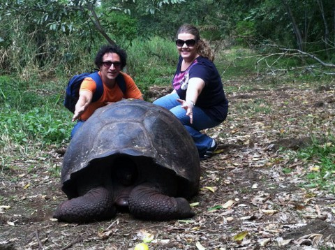 Osvaldo Di Paolo and Marissa Chandler examine a rather large tortoise while in the Galapagos Islands.