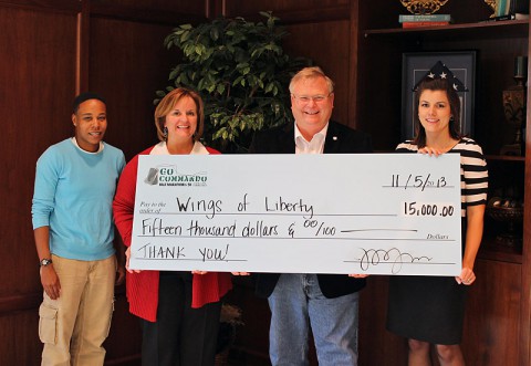 Fort Campbell Historical Foundation check was accepted by Robert Nichols. From L to R: Channel Lemon, Race Director; Christy Batts, CDE Lightband; Robert Nichols; Jessica Goldberg, Race Director.