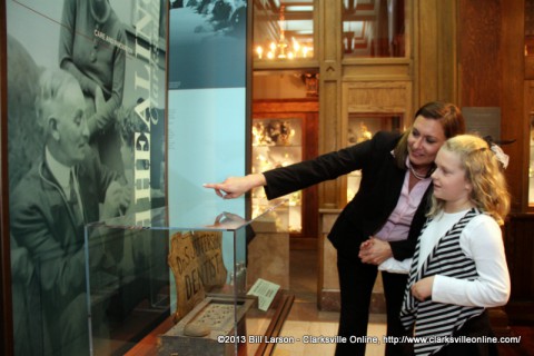 A visitor to the Customs House Museum shows her daughter one of the exhibits