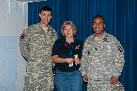Lt. Col. Dave Zimmerman, commander, and Command Sgt. Maj. Galu P. Satele, 6th Battalion, 101st Combat Aviation Brigade, 101st Airborne Division (Air Assault), stand with Jerri Huber, co-chair of the Barclay Elementary fall festival on Fort Campbell, Ky., Oct. 25, 2013. (Sgt. Duncan Brennan, 101st CAB Public Affairs) Lt. Col. Dave Zimmerman, commander, and Command Sgt. Maj. Galu P. Satele, 6th Battalion, 101st Combat Aviation Brigade, 101st Airborne Division (Air Assault), stand with Jerri Huber, co-chair of the Barclay Elementary fall festival on Fort Campbell, Ky., Oct. 25, 2013. (Sgt. Duncan Brennan, 101st CAB Public Affairs)
