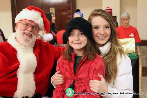 Children sat on the sleigh with Santa and told him about all the toys they wanted for Christmas at the Montgomery County Tree Lighting Ceremony. Santa was also handing out plenty of candy to everone that paid him a visit.