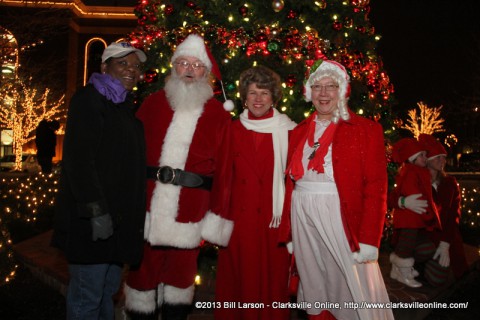 Khandra Smalley of F&M Bank with Santa and Mrs. Claus and Clarksville Mayor Kim McMillan