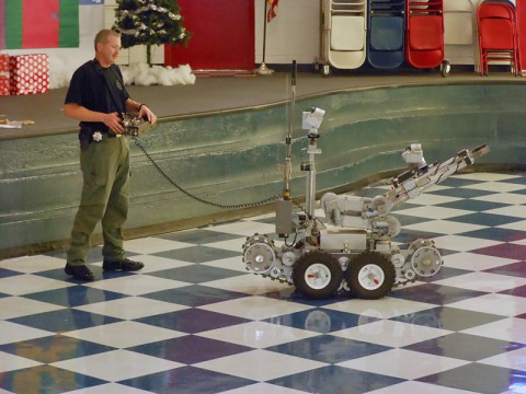 Deputy Tim Harp introduces Barksdale students to the bomb robot.