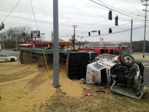A grain truck overturned at the intersection of Tiny Town Road and Peachers Mill Road. (Clarksville Police Department) A grain truck overturned at the intersection of Tiny Town Road and Peachers Mill Road. (Clarksville Police Department)