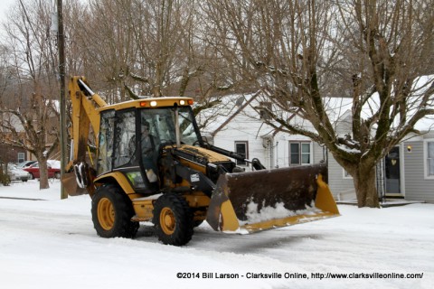 The Clarksville Street Department's Backhoe Loader heading to Gill Street The Clarksville Street Department's Backhoe Loader heading to Gill Street