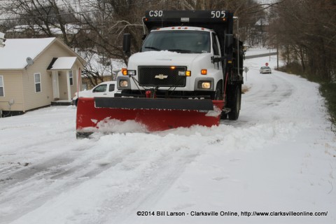 The Clarksville Street Department Snow Plow Driver finishes the job on Gill Street The Clarksville Street Department Snow Plow Driver finishes the job on Gill Street