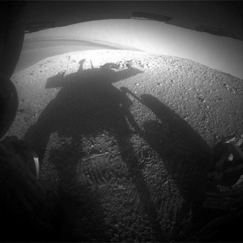 NASA's Mars Exploration Rover Opportunity caught its own silhouette in this late-afternoon image taken by the rover's rear hazard avoidance camera on March 20th, 2014. (NASA/JPL-Caltech) NASA's Mars Exploration Rover Opportunity caught its own silhouette in this late-afternoon image taken by the rover's rear hazard avoidance camera on March 20th, 2014. (NASA/JPL-Caltech)