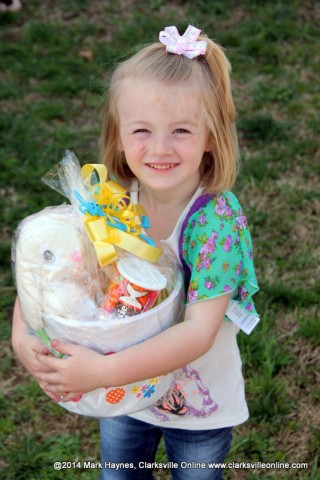 One of the lucky winners at the 2014 Cunningham Fire Department Easter Egg Hunt.