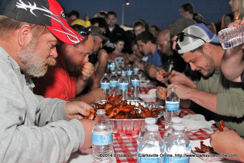 A Hot Wing Eating Contest was just one of the events Friday night that kicked off Hilltop Market's BBQ Cook Off.