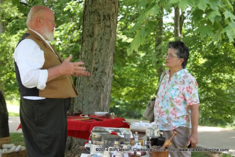 Mark Britton talks to Rebecca Hines about his civil war medicine display at the Friends of Fort Defiance's March to the Past
