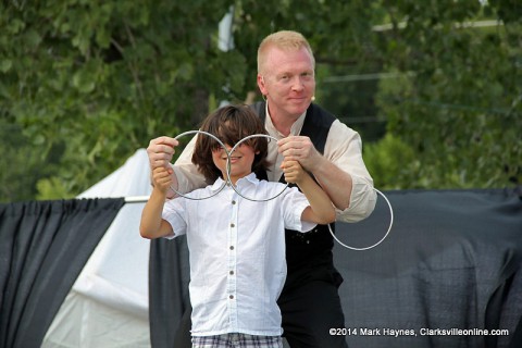 Magician Russ Nowack performing at the 2014 Clarksville Riverfest Festival.