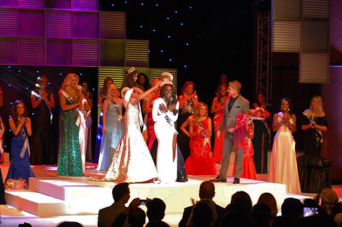 Miss Tennessee USA 2015, Kiara Young, accepts her crown from Miss Tennessee USA 2014, Kristy Landers Niedenfuer, and Miss Tennessee Teen USA 2015, Hannah Faith Greene.