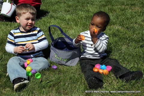Two little ones having fun at the Easter Egg Hunt.