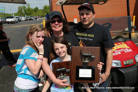 Serious Hog won Grand Champion at the 2015 Hilltop BBQ Cook-Off. (L to R) Lexie Schimmel, Caden Schimmel, Lisa Rooks and Matt Rooks.