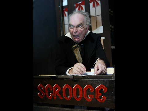 John McDonald as Ebenezer Scrooge in The Roxy Regional Theatre's production of "A Christmas Carol."