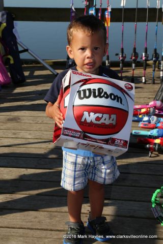 This little boy won a basketball.