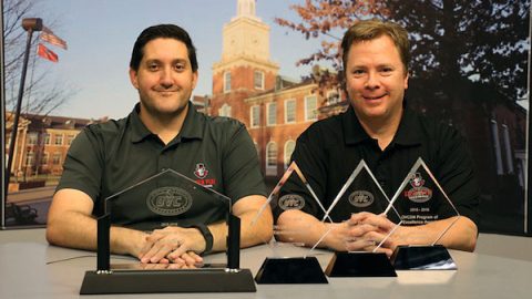 David Ellison, APSU video production coordinator, and Barry Gresham, APSU communication instructor, display the OVC awards the APSU Department of Communication’s Sports Broadcasting Program received earlier this month. (Photo by Lakyn Jarman/APSU)