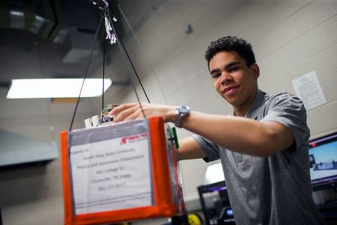 Austin Peay student, Dominic Critchlow shows off his air balloon research.