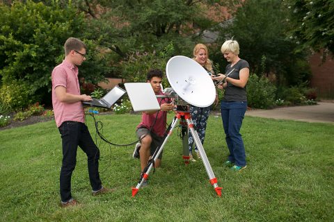 Austin Peay Physics students Mary Sencabaugh, Jacob Robertson, Megan McCracken and Dominic Critchlow prepare the ground system they built to track the high altitude balloon they will release during the 2017 Total Solar Eclipse. (APSU)