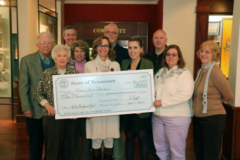 Minoa Uffelman holding the $3,000 Archive Development Grant check from the State of Tennessee.