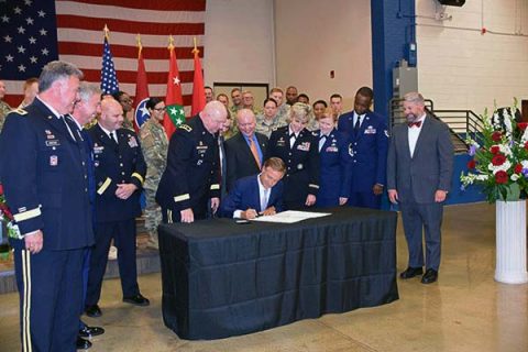 Tennessee Governor Bill Haslam signs the Tennessee STRONG (Support, Training and Renewing Opportunity for National Guard) Act May 25th, 2017 at the Tennessee Department of Military in Nashville. (MSgt Robin Brown, Tennessee National Guard) Tennessee Governor Bill Haslam signs the Tennessee STRONG (Support, Training and Renewing Opportunity for National Guard) Act May 25th, 2017 at the Tennessee Department of Military in Nashville. (MSgt Robin Brown, Tennessee National Guard)
