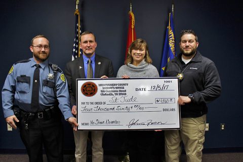 Montgomery County Sheriff John Fuson, Deputy Chad O’Brien, and Investigator Ryan Ayrest present a check to Jackie Proffit with St. Jude’s Entertainment Marketing for $4,060. Montgomery County Sheriff John Fuson, Deputy Chad O’Brien, and Investigator Ryan Ayrest present a check to Jackie Proffit with St. Jude’s Entertainment Marketing for $4,060.
