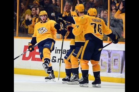 Nashville Predators left wing Kevin Fiala (22) celebrates with teammates after a goal during the second period against the New York Rangers at Bridgestone Arena. (Christopher Hanewinckel-USA TODAY Sports) Nashville Predators left wing Kevin Fiala (22) celebrates with teammates after a goal during the second period against the New York Rangers at Bridgestone Arena. (Christopher Hanewinckel-USA TODAY Sports)