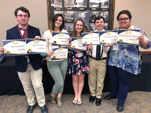 The All State staff show their 10 awards from the the annual Southeast Journalism Conference.