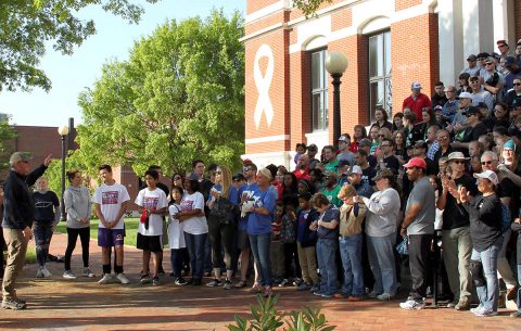 Montgomery County Mayor Jim Durrett speaks to the volunteers on the Historic Courthouse stairs before clean-up efforts began.