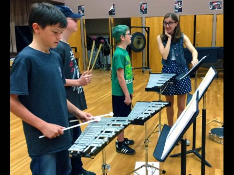 Mackenzie Kelly works with percussion students during Austin Peay’s beginning band program for homeschool students.