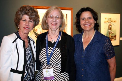 Clarksville Mayor Kim McMillan, AHDC Director Ellen Kanervo and Anne Pope, executive director of the Tennessee Arts Commission, gathered Wednesday to greet an arts conference reception audience at the Customs House Museum.