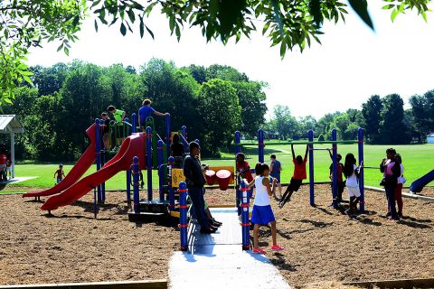 Children from the Kleeman Community Center enjoy the newly renovated Bel-Aire Park after the ribbon cutting ceremony June 7th, 2018. The ceremony marked the official reopening of the park, after it received much needed equipment upgrades. Children from the Kleeman Community Center enjoy the newly renovated Bel-Aire Park after the ribbon cutting ceremony June 7th, 2018. The ceremony marked the official reopening of the park, after it received much needed equipment upgrades.