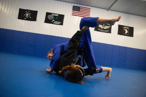 Brinna Lavelle spars with MiMi Bowen at Bowen Combative Arts Academy in Clarksville. Lavelle has been in judo since she was three.