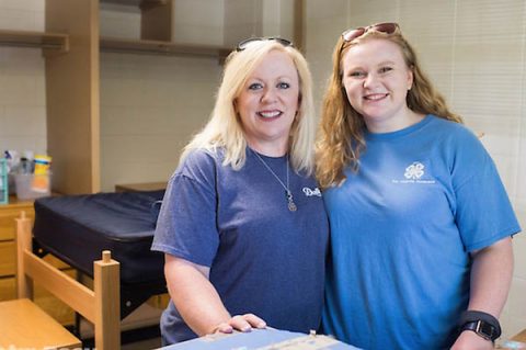 Janine and Janesa Wine stand in the Austin Peay dorm room where Janine lived 28 years ago and where Janesa will live this year.