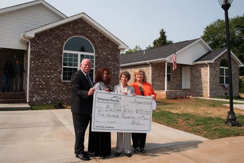 Tennessee Housing Development Agency presented a $500,000 check toward the construction of these homes during the ceremony to Buffalo Valley.