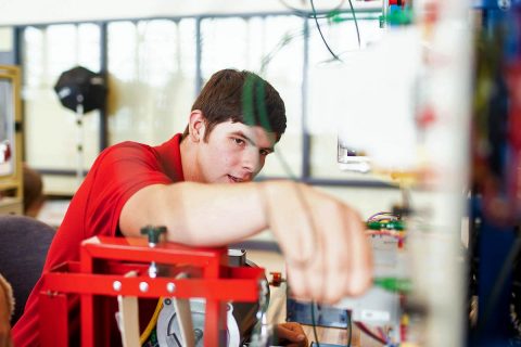 Austin Peay State University sophomore Grayson Phillips of Cheatham County gets a crack at APSU's new mechatronics system.
