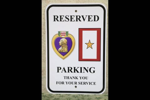 New reserved parking sign for Purple Heart recipients and Gold Star families.