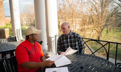 Joe Shakeenab and Jeff Bagley, both 28-year Army veterans, discuss the stories they’re working on in Writing for Military and Families, a class offered at Austin Peay State University through the Community School of the Arts.