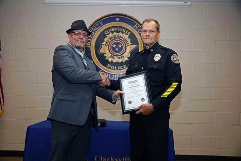 Sergeant Terry Minton is congratulated by Clarksville Police Chief Al Ansley during his retirement ceremony. (Jim Knoll, CPD) Sergeant Terry Minton is congratulated by Clarksville Police Chief Al Ansley during his retirement ceremony. (Jim Knoll, CPD)